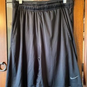 Nike dri fit black shorts. 7 inch length, medium.